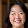 Xiaomei Chen souriante avec sa famille